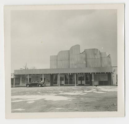 Building structure, car in front, Joyland Park; front view