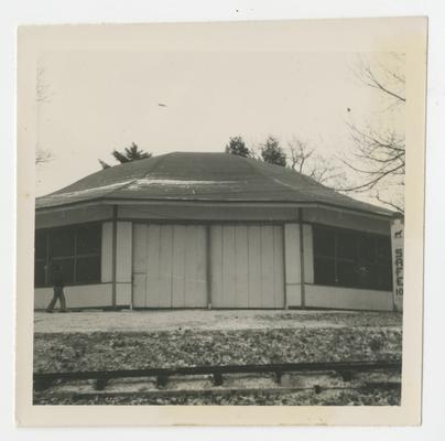 Circular building with two panels and two large windows on either side, Joyland Park