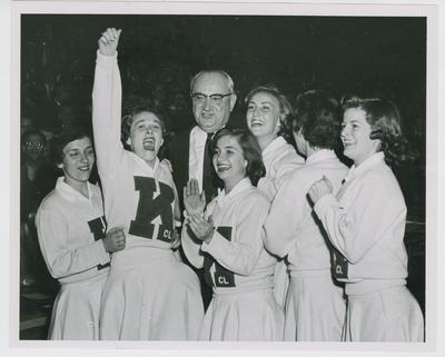 Adolph Rupp with cheerleaders