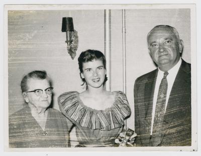 Unidentified woman, Jane Brock, and Adolph Rupp