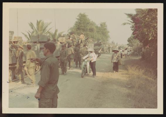 Troop on stand-down along Highway 1, Joe Parisi in foreground