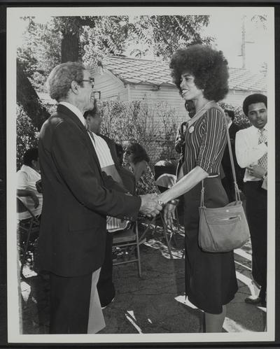 Ms. Angela Davis with Lyman T. Johnson at home of John H. Johnson, Louisville