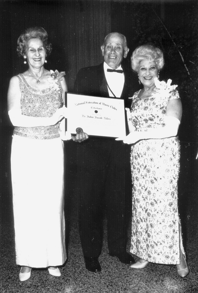 Presentation of award from the Kentucky Federation of Music Clubs to Niles from Mrs. Frank Liddell and Mrs. Maurice Horrigman