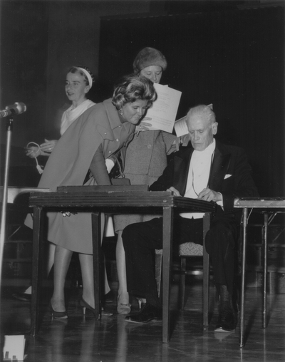 John Jacob Niles with two unidentified women after a performance at Transylvania University of the Merton Song Cycle Tour; Jack Cobb