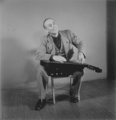 John Jacob Niles posed with dulcimer