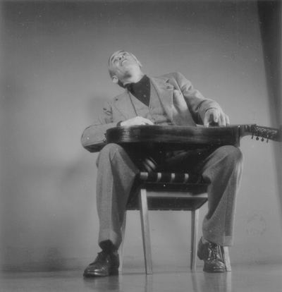 John Jacob Niles posed with dulcimer