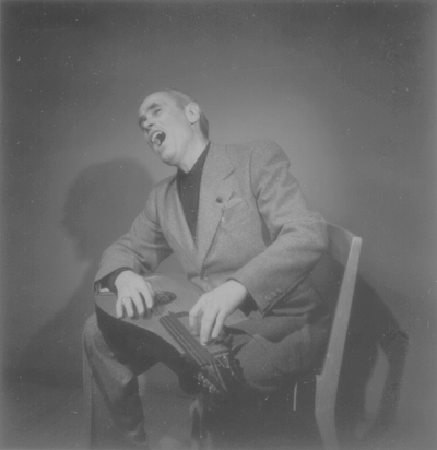 John Jacob Niles posed with dulcimer