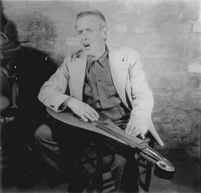 John Jacob Niles posed with dulcimer