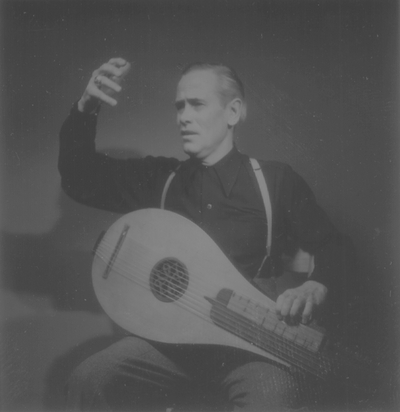 John Jacob Niles posed with dulcimer