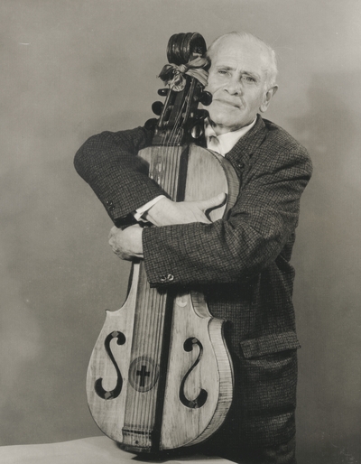 John Jacob Niles with dulcimer; promotional photo; St. Louis Post-Dispatch