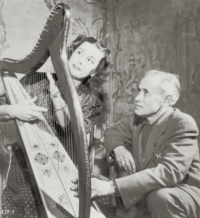 John Jacob Niles with Gladys Swarthout, taken at her apartment; New York City