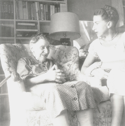 Miss Henrietta Child, daughter of Francis J. Child, seated, with Rena and John Jacob Niles; taken at home of Eleanor Churchill; Berea, KY