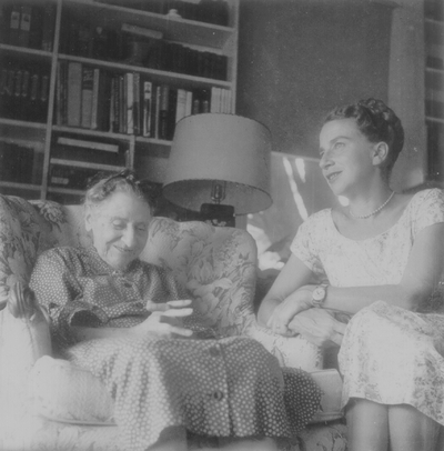 Miss Henrietta Child, daughter of folk songwriter Francis J. Child, seated with Rena Niles, taken at the home of Eleanor Churchill; Berea, KY