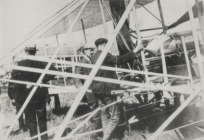 Orville Wright and the engine of his airship just after record-breaking flight; Paul Thompson