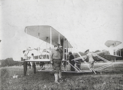 Wright Brothers' aeroplane leaving the barn to be put on the slide; Paul Thompson