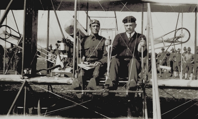 Lt. Foulois and Parmalee, who have been conducting war experiments with an Army aeroplane at San Antonio; Paul Thompson