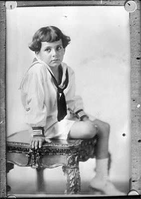 portrait of a young child (appears to be the same child as in item #6), copy negative