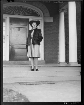 Jane Elgin Dudley standing in front of an entranceway to an                             unidentified building; (1940 Kentuckian) (University of                             Kentucky)