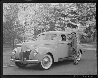 Mary Margaret Gentry standing next to a car; (1940 Kentuckian)                             (University of Kentucky)