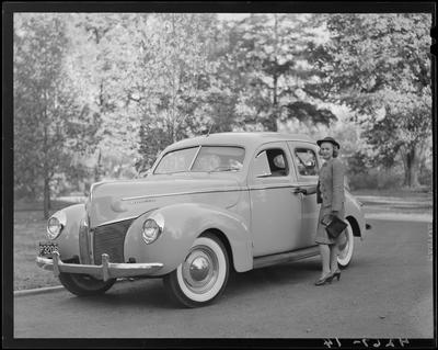 Mary Margaret Gentry standing next to a car; (1940 Kentuckian)                             (University of Kentucky)