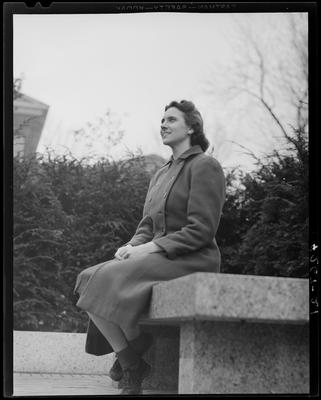 Mary Gore Rodes sitting on a bench; (1940 Kentuckian) (University                             of Kentucky)