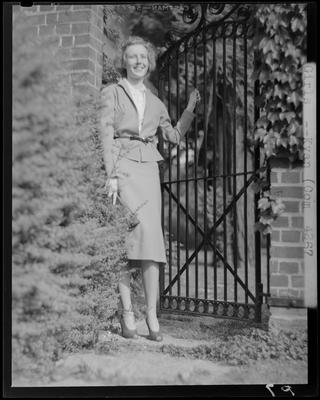 Doradel Young standing next to an iron gate; (1940 Kentuckian)                             (University of Kentucky)