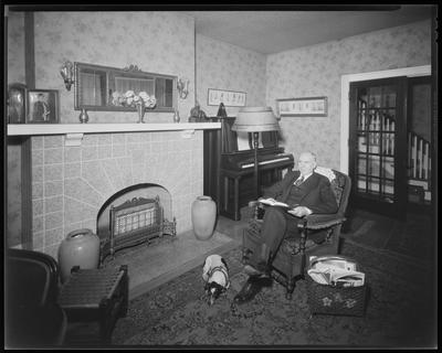 Parlor, man sitting and reading