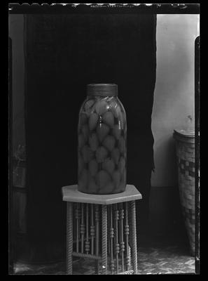 Jar of pears on a stand