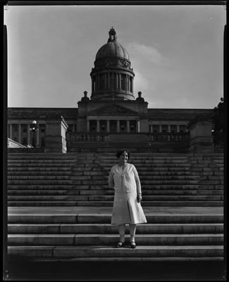 Woman standing on capitol steps