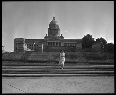 Woman standing on capitol steps