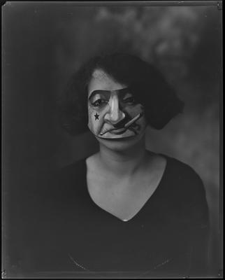 Woman in clown mask