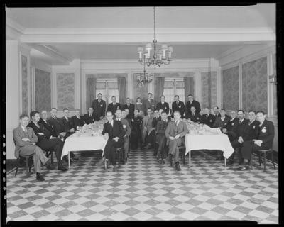 Group of men around u-shaped table