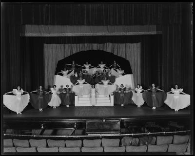 Troupe of girls dancing on Henry Clay stage