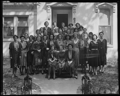 Young women on steps of building