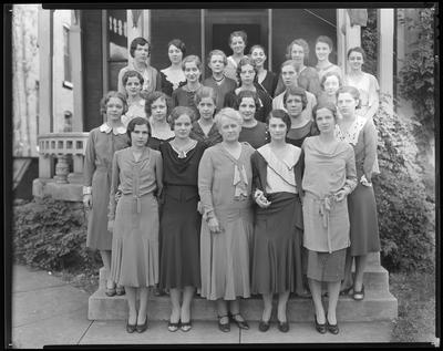 Young women on steps of building