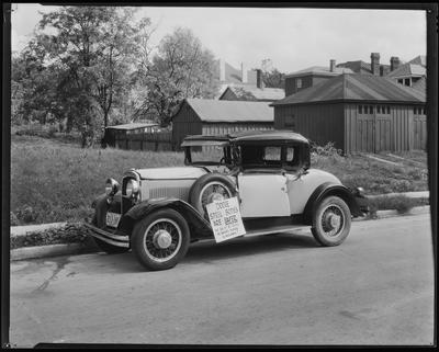 1930 Dodge coupe (w/ safety voucher sign)