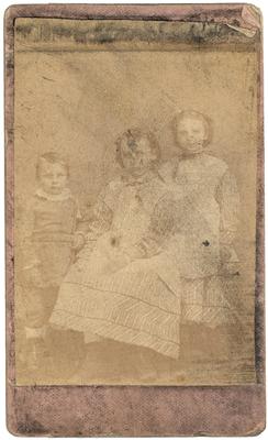 Two unidentified young girls and a young boy
