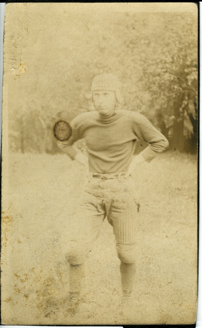 Man in a football uniform circa 1914