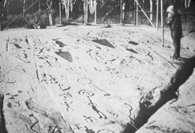 Petroglyphs near Petersborough - Note on slide: Tifinag letters and Alqonquian Pictograms. B. Fell / Bronze Age America