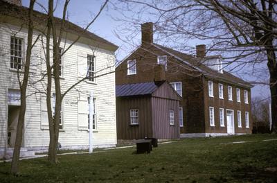 W. Family wash house, preserve shop, sister's shop - Note on slide: Exterior view of buildings