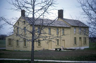 (C.) Family wash house - Note on slide: Exterior view of building