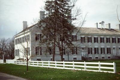 Center family house - Note on slide: Exterior view of center family house from the east