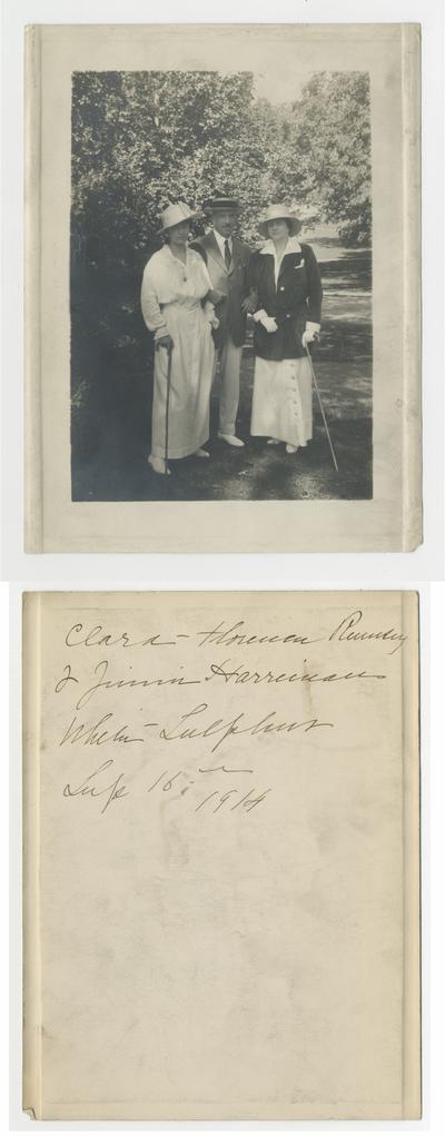 Clara D. Bell with two unidentified individuals. Clara pictured on right