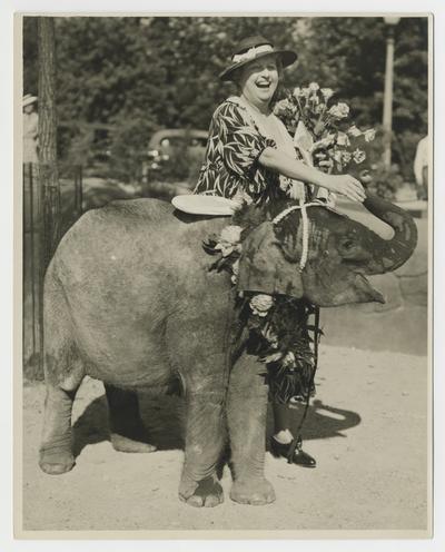 Clara D. Bell with a small elephant