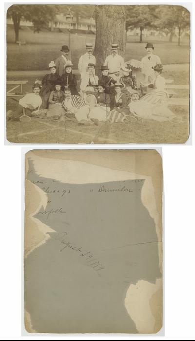 Unidentified group of men and women with tennis racquets