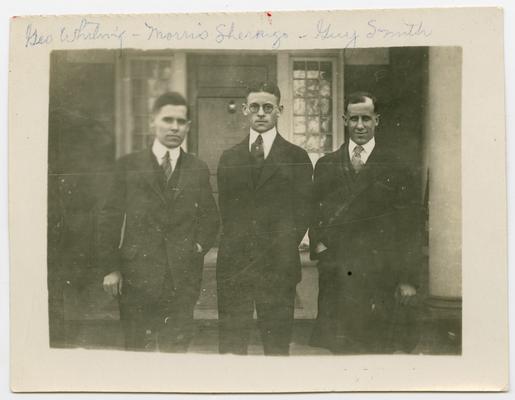 George Whiting, Morris Sherrig?, Gary Smith posed in front of a porch of a house