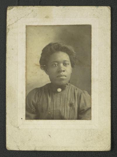 Portrait of an unidentified black woman [Bessie W?], note on back reads Compliments of Bessie H. [W?] to Miss Mary Wilson