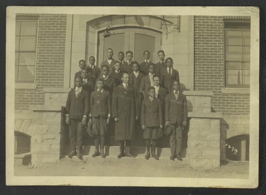 Group photo of unidentified black man and young boys [teacher and students?]