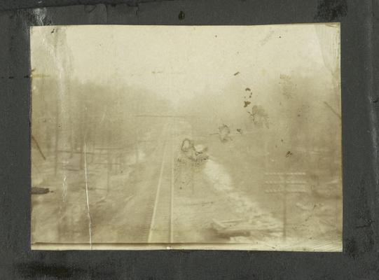 Page 8 [R]: View down railroad tracks
