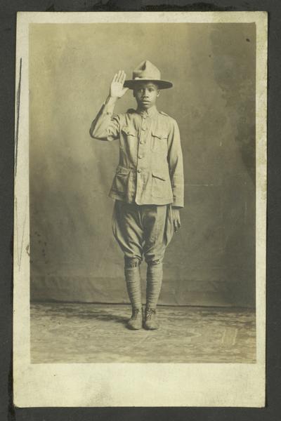 Page 9: Unidentified young black boy in military or boy scout uniform